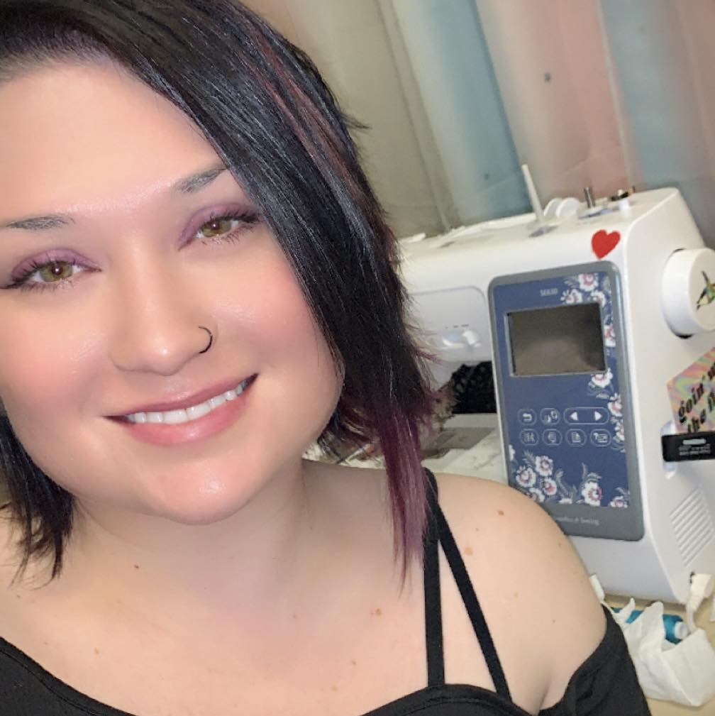 Mo, the artist and seamstress behind ToysByMo